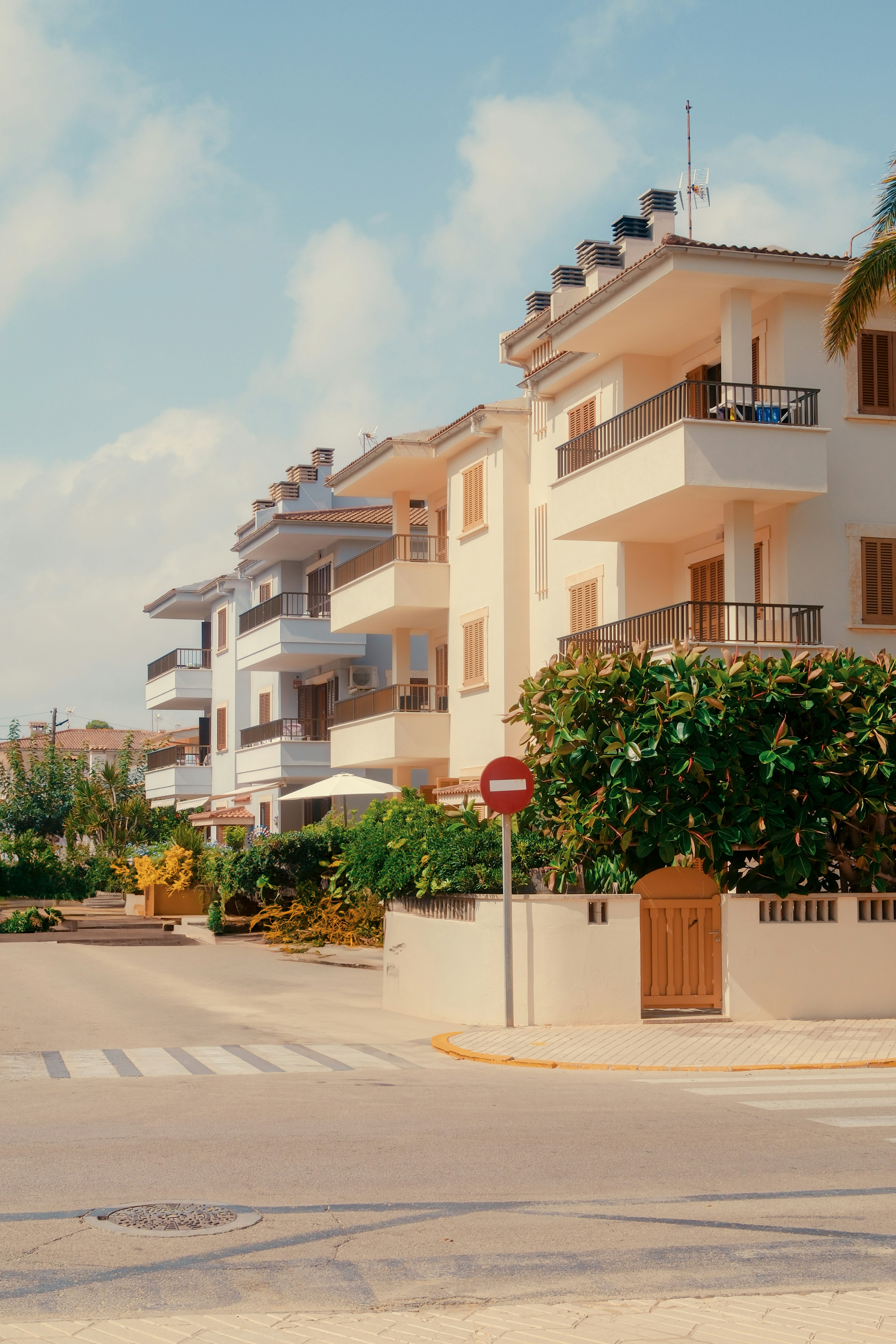 A number of white apartments